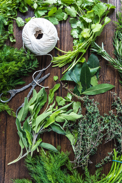 Many fresh garden herbs from above on table - Photo, Image
