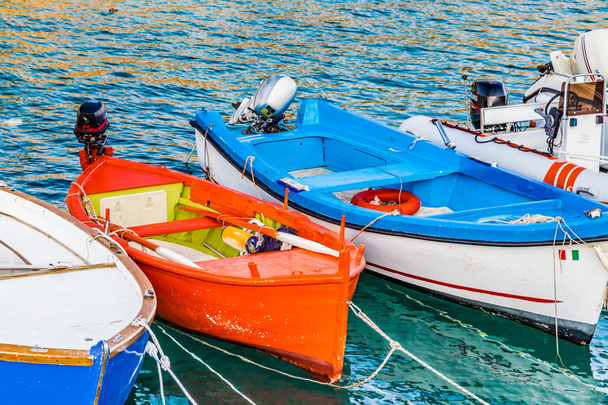 boats moored in a cove on the coast of Salento, on the Adriatic Sea in Italy - Photo, Image