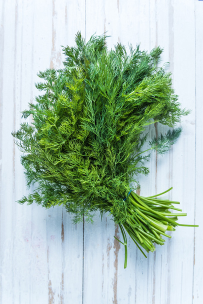 Fresh dill from garden on wooden table - Photo, Image