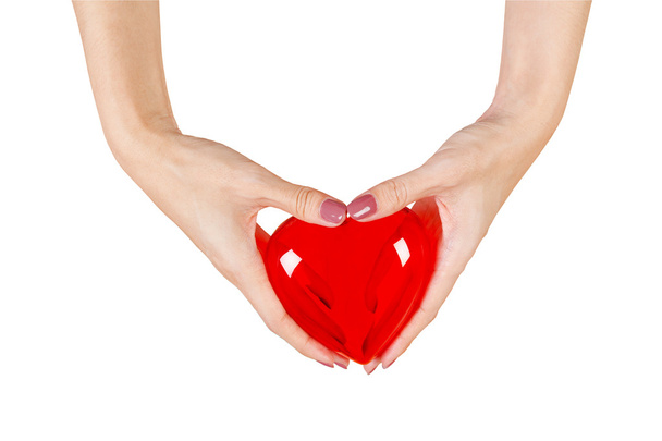 Heart in the hands isolated on white background - Фото, зображення
