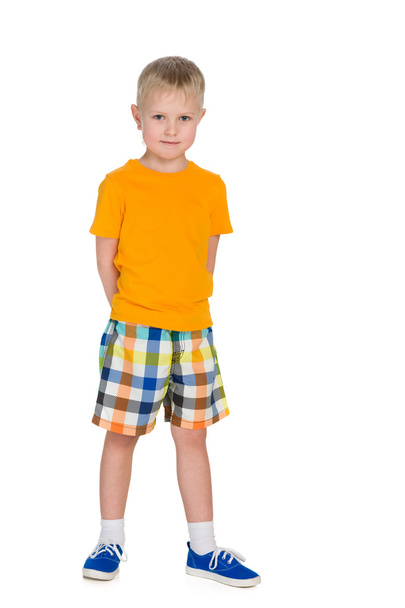 Little boy in a yellow shirt - Фото, изображение