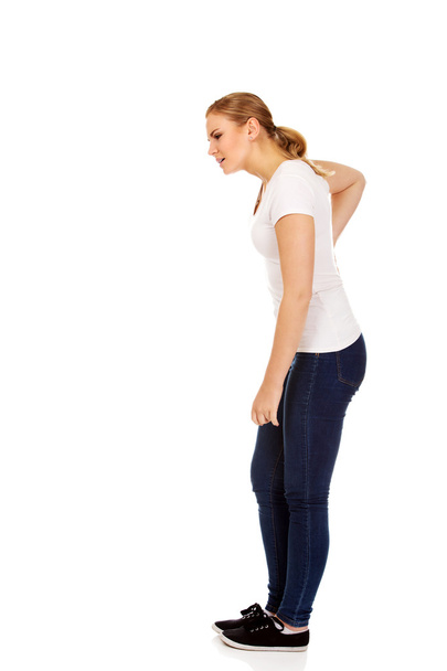 Young woman with back ache - Φωτογραφία, εικόνα