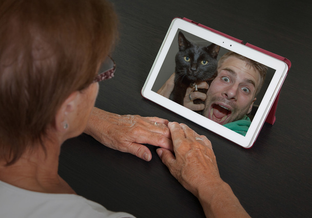Senior woman with tablet - Photo, Image