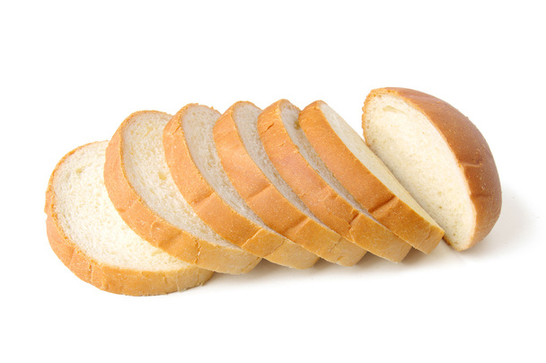 The cut loaf of bread isolated on white - Photo, Image