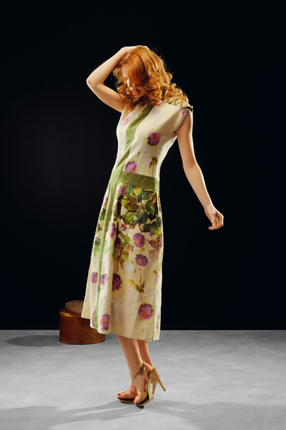 red hair model posing in fashion dress - Fotó, kép