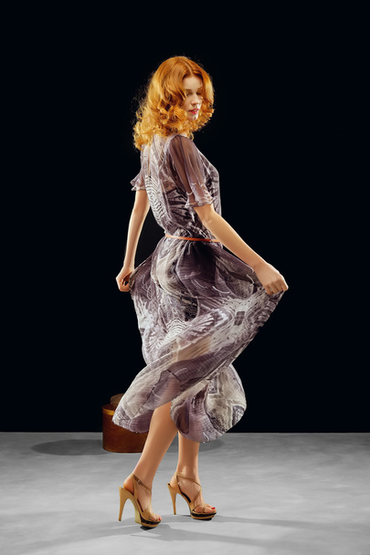 red hair model posing in fashion dress - Foto, Imagen