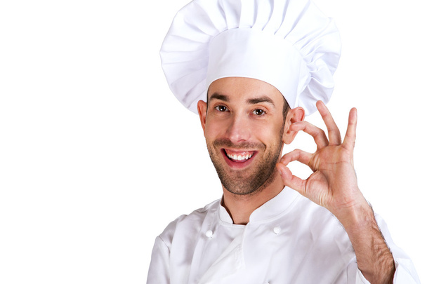 Professional chef man. Isolated over white background. Showing p - Fotografie, Obrázek