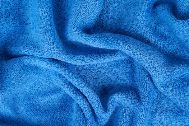blaues Frottee-Handtuch - Foto, Bild