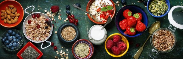 Healthy breakfast of muesli, berries with yogurt and seeds - Fotografie, Obrázek