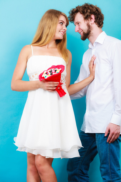 Happy couple with candy bunch flowers. Love. - Foto, immagini