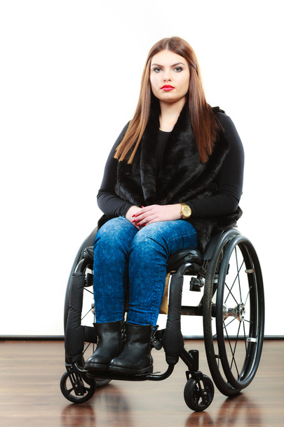 Teen girl  sitting on wheelchair - Фото, зображення
