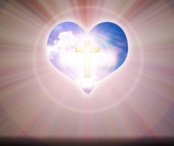 Crucifix and light on heart background   - Photo, Image