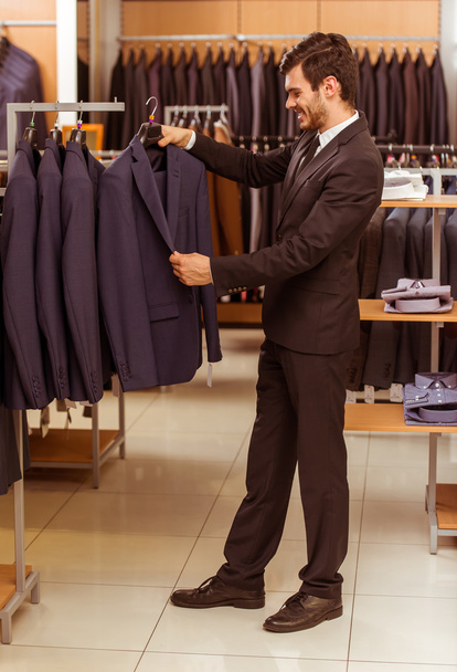 People in suit shop - Foto, Imagen