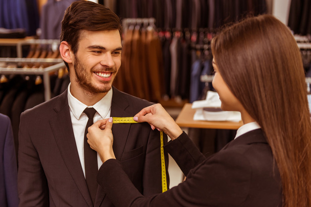 People in suit shop - Photo, image