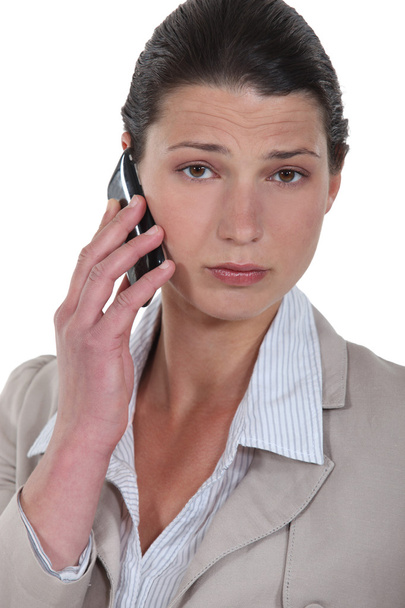 Businesswoman talking on her cell - Photo, Image