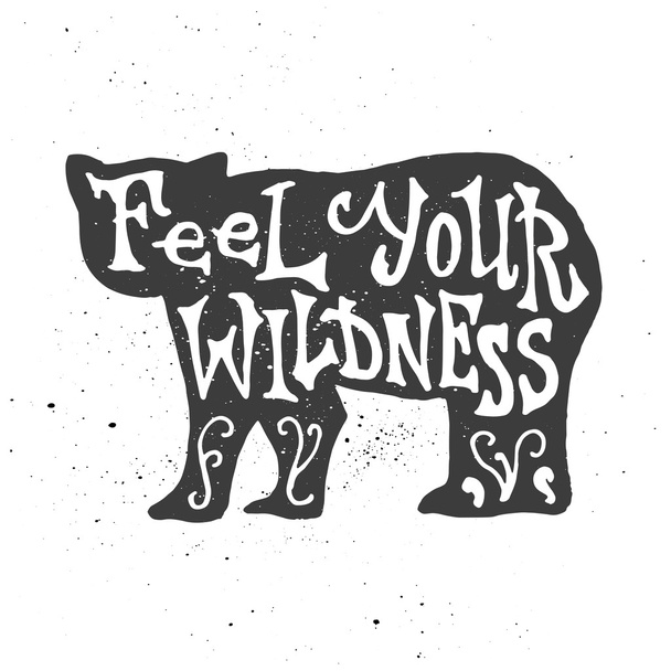 Feel your wildness lettering in bear silhouette. - Vector, afbeelding