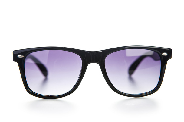 Black sunglasses close up. Isolated on a white. - Fotó, kép