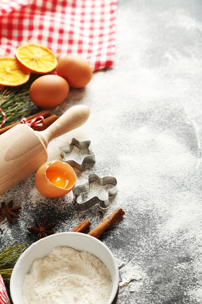 dried oranges, cinnamon, eggs, flour and star anise - Fotó, kép
