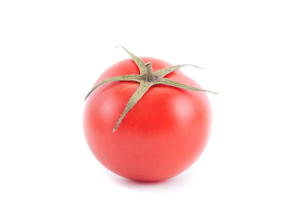 Ripe tomato closeup on a white background. - Foto, Imagen