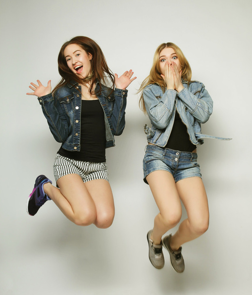 young hipster girls best friends jump - Foto, imagen