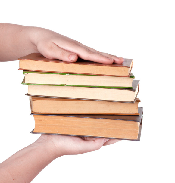 hand giving pile of book  - Foto, imagen
