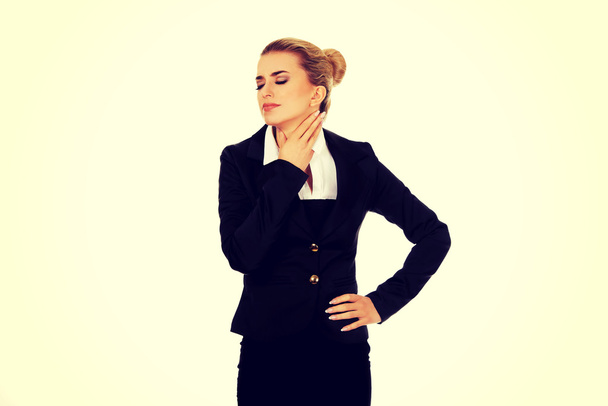 Businesswoman with throat pain - Photo, image