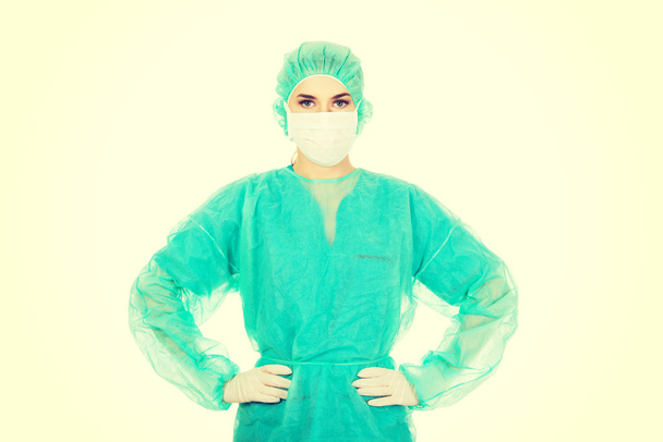 Female surgeon doctor in protective mask - Fotó, kép