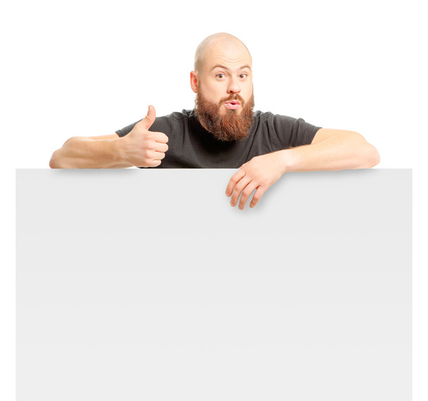 Bearded man showing thumb up - 写真・画像