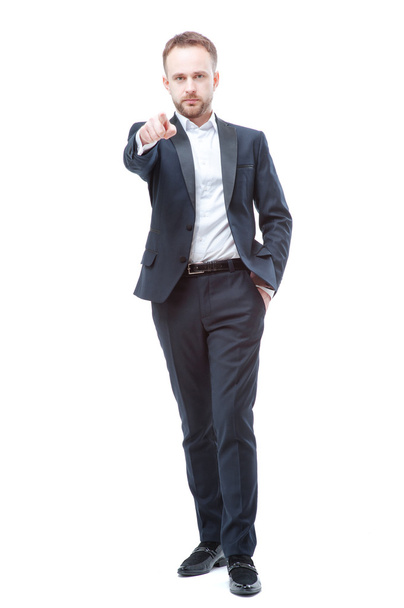 Confident young businessman pointing you - 写真・画像