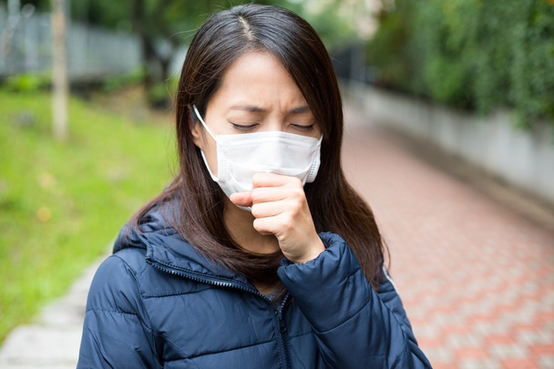 Asian woman sick and wearing face mask - Photo, Image