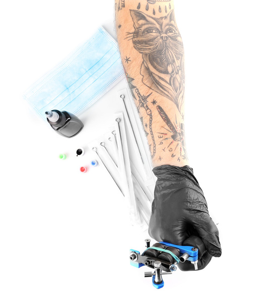 Tattooist hands in black gloves  - Foto, immagini