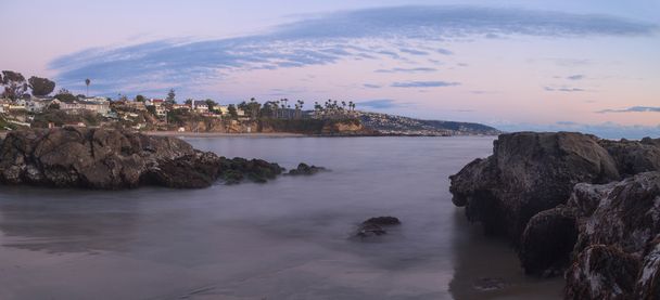 Crescent Bay Beach panoraamanäkymät merelle auringonlaskun aikaan
 - Valokuva, kuva