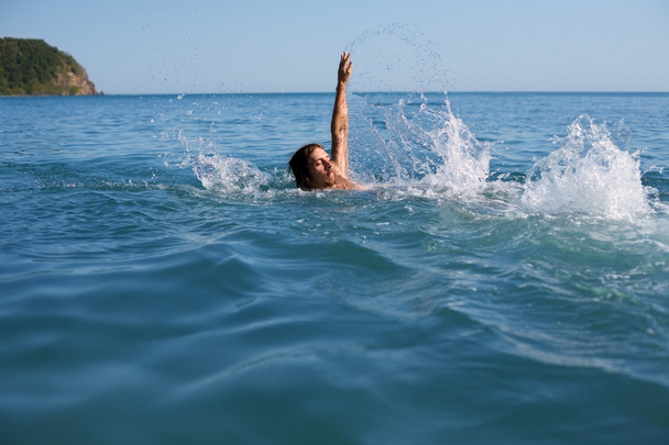 Man swims back - Photo, image