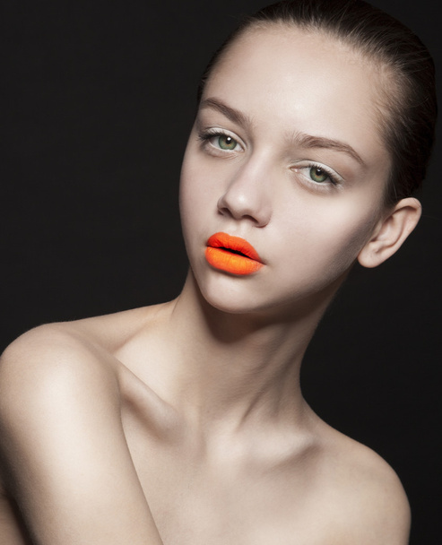 young woman with orange lips - Foto, Imagem