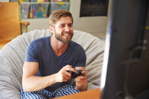 Man Playing Video Game - Fotó, kép