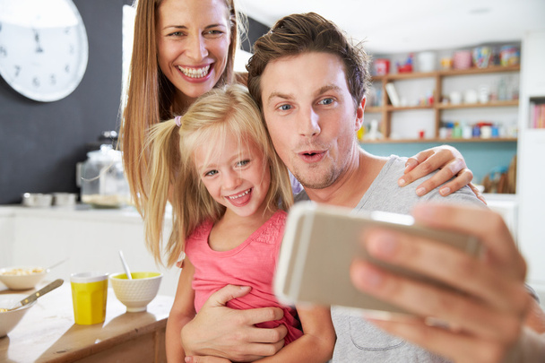 Family Posing For Selfie - 写真・画像