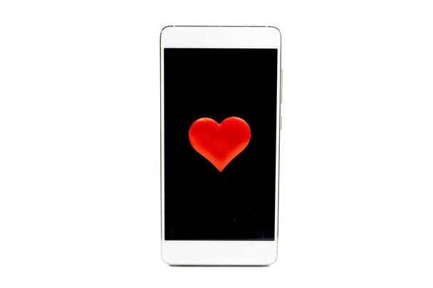 Teléfono inteligente con pantalla en blanco y corazón
  - Foto, Imagen
