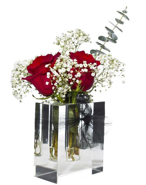 Rose rosse in vaso a forma di vetro
 - Foto, immagini