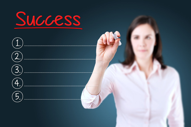 Business woman writing blank Success list. Blue background. - Photo, Image