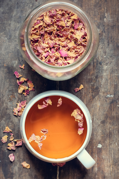 rose tea , flower petals, bank , container , glass , floral, herbal , natural - Foto, Imagen