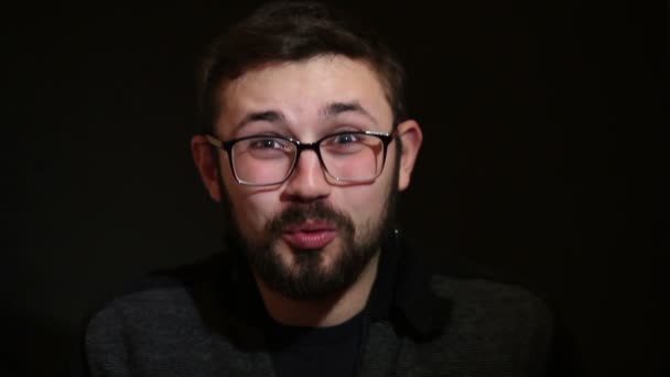 set of handsome emotional man over dark background - Footage, Video