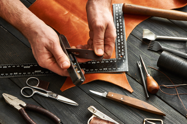 Man working with leather  - Photo, Image