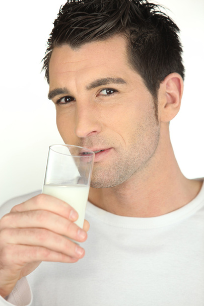 Man drinking a milk glass - Foto, Imagem