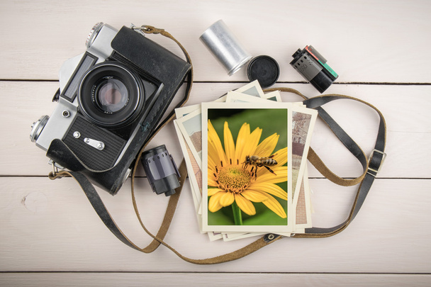 Куча фотографий и старая камера
 - Фото, изображение