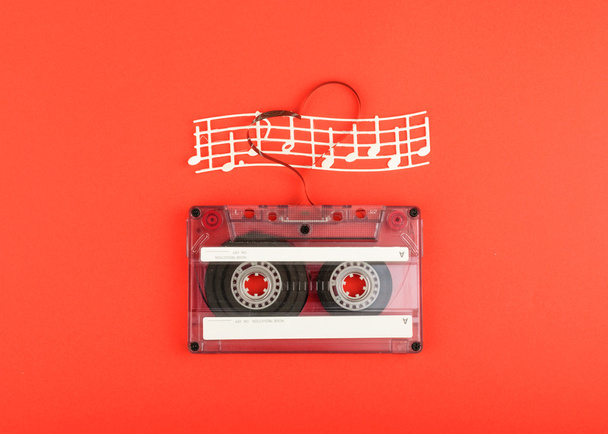 Vintage audio cassette with loose tape shaping a heart - Photo, Image