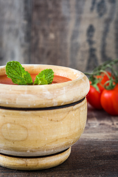 Tomato soup on wood - Фото, изображение
