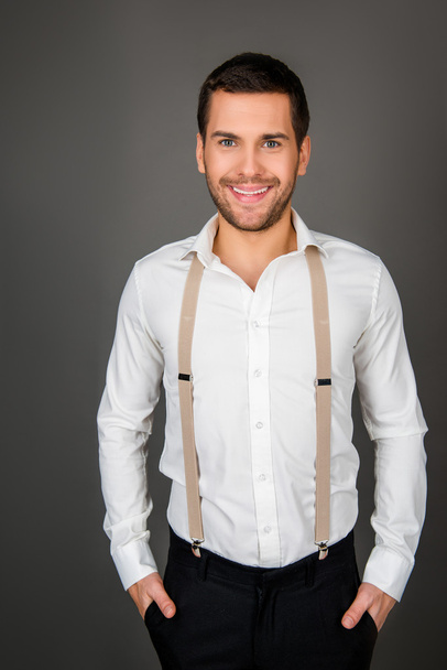 Portrait of a young sexy man with beaming smile - Foto, Imagem
