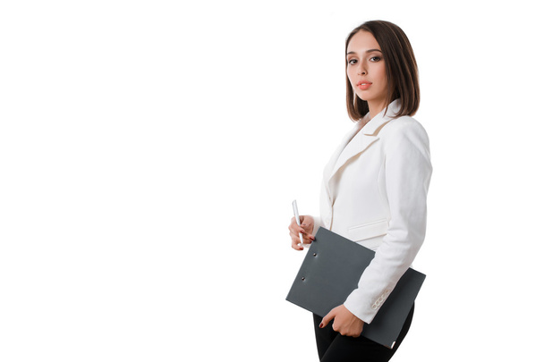 sexy zakenvrouw met een bril met de tablet op een witte achtergrond - Foto, afbeelding