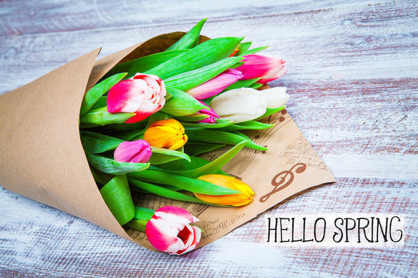 bouquet of tulips wrapped in paper - Foto, imagen