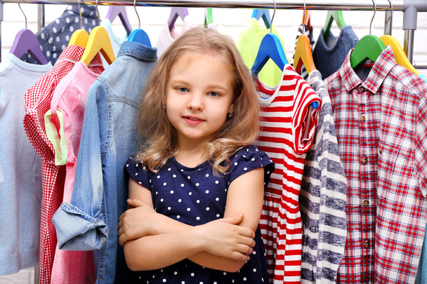 Little girl and clothes - Photo, image
